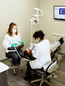 Two nurses in a dental office